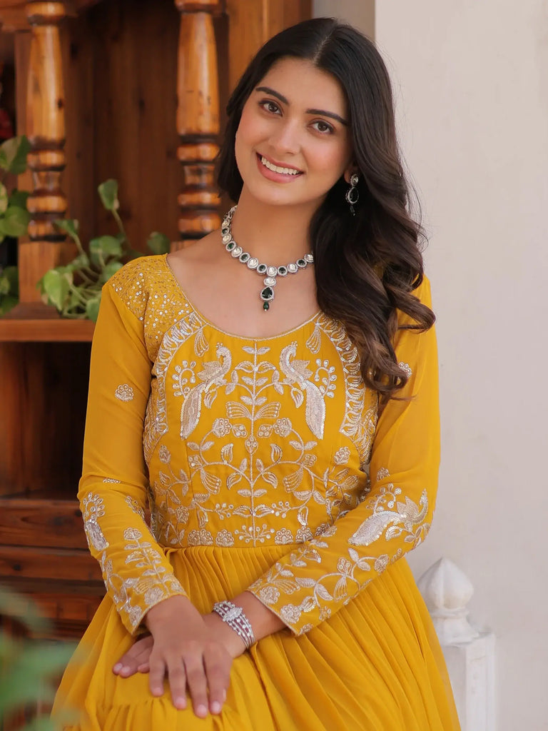 Fascinating Yellow Sequins Georgette Haldi Wear Gown