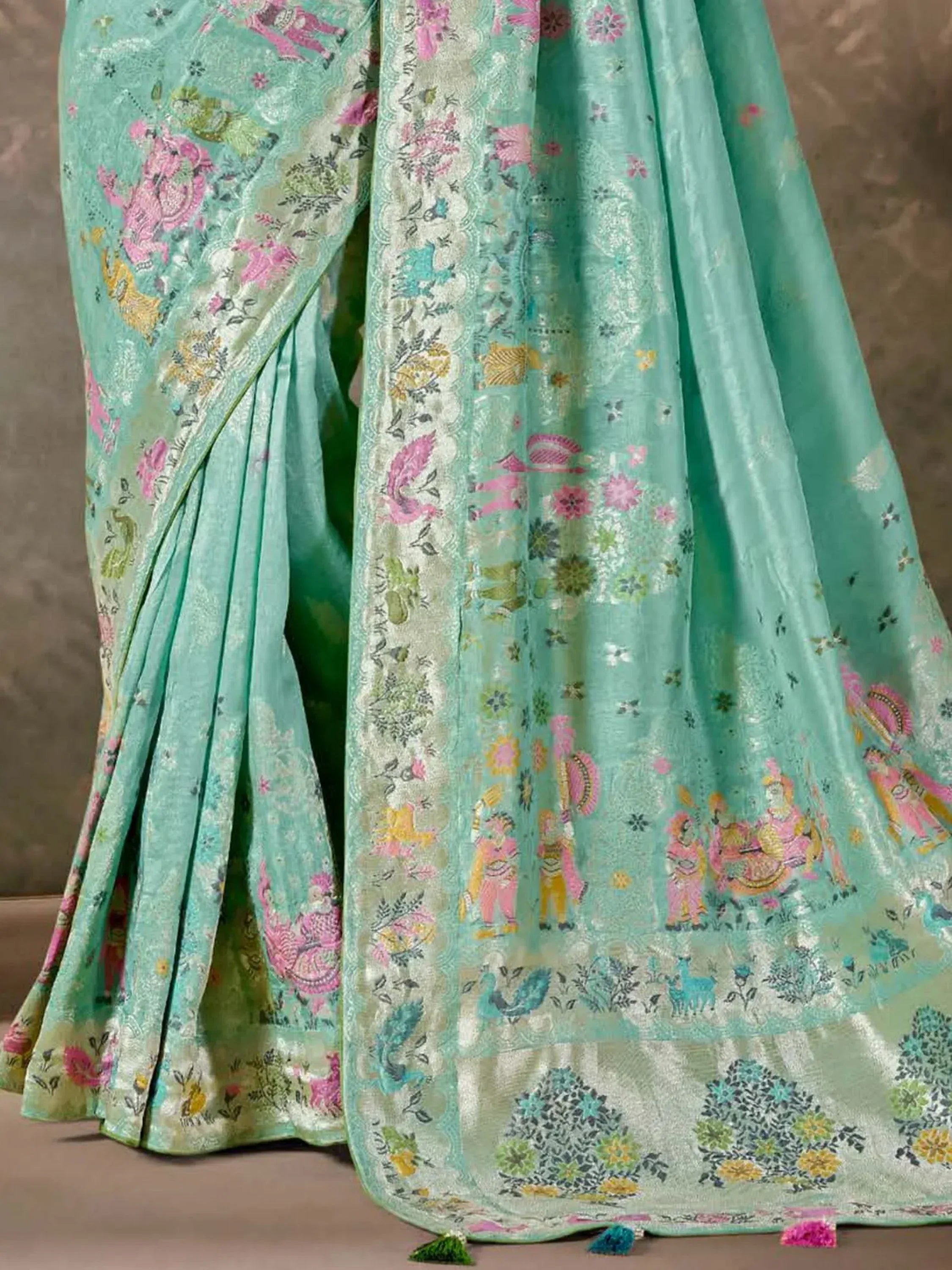 Mint green ethnic saree with pink elephant & floral print, perfect for Indian weddings or festivals