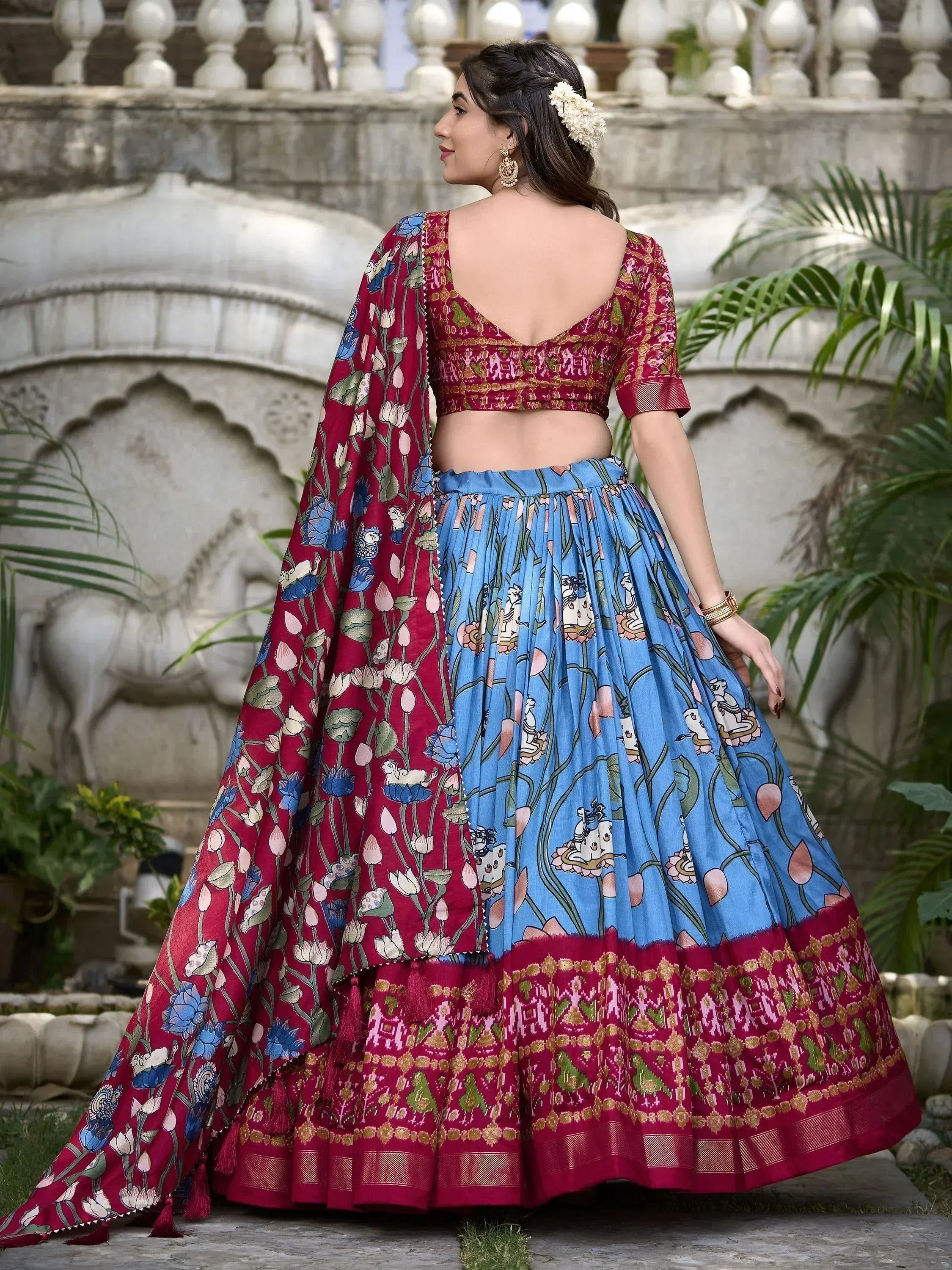 Blue and maroon floral print lehenga choli with backless blouse, perfect for Indian ethnic occasions