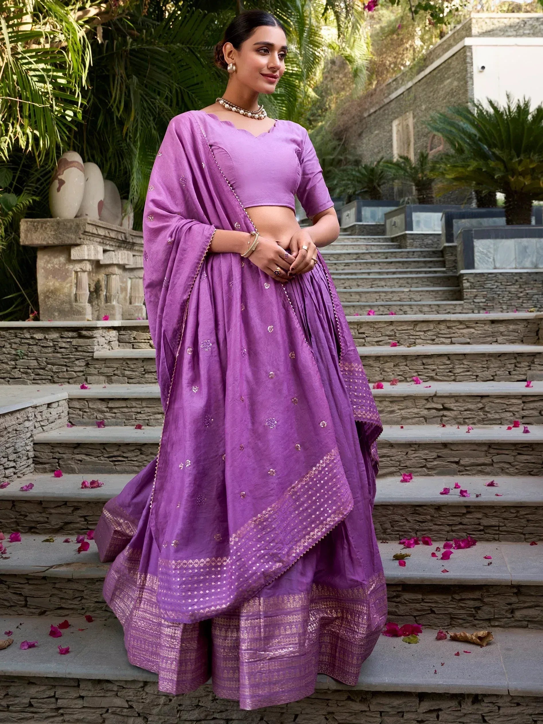 Purple designer lehenga choli with gold embroidery, perfect for Indian ethnic wear occasions