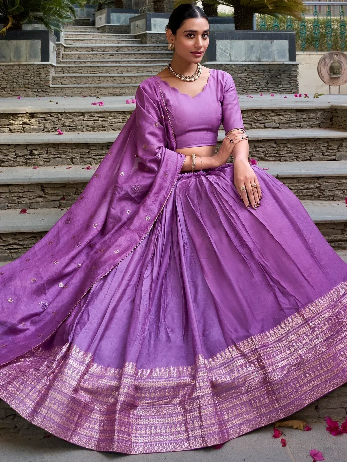 Purple designer lehenga choli with gold embroidery, perfect for Indian ethnic wear occasions
