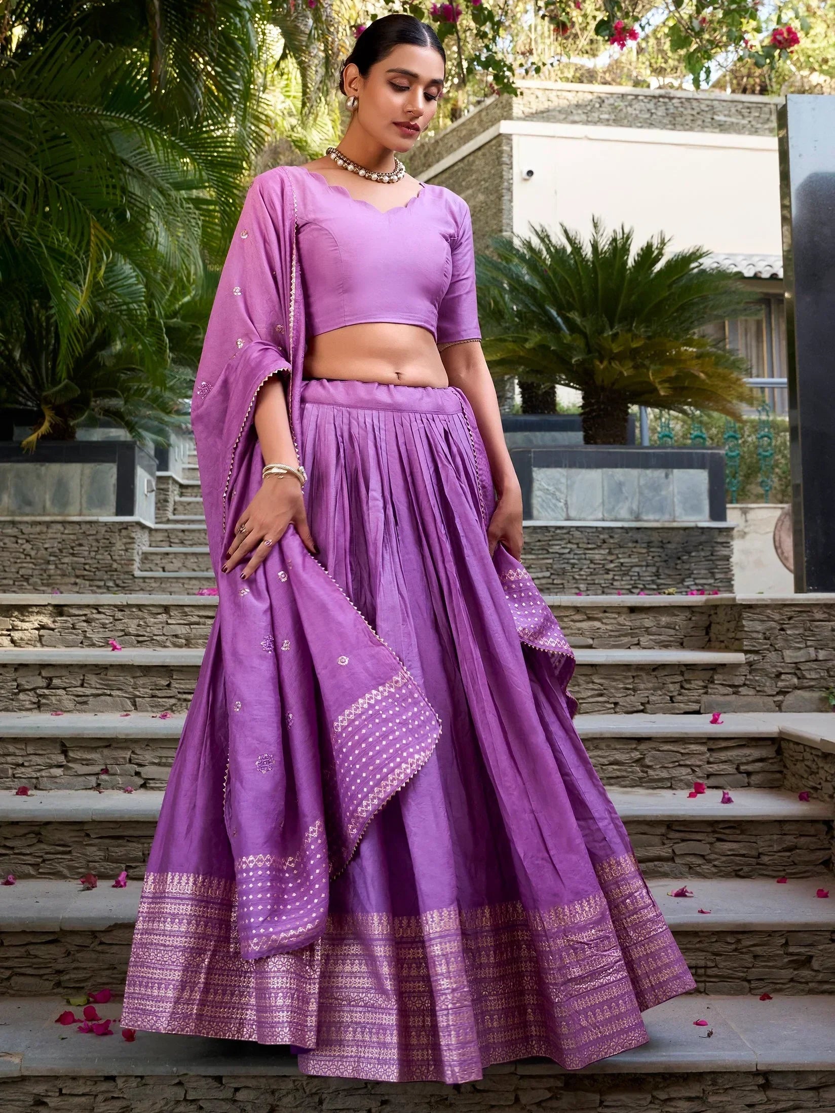 Purple designer lehenga choli with gold embroidery, perfect for Indian ethnic wear occasions