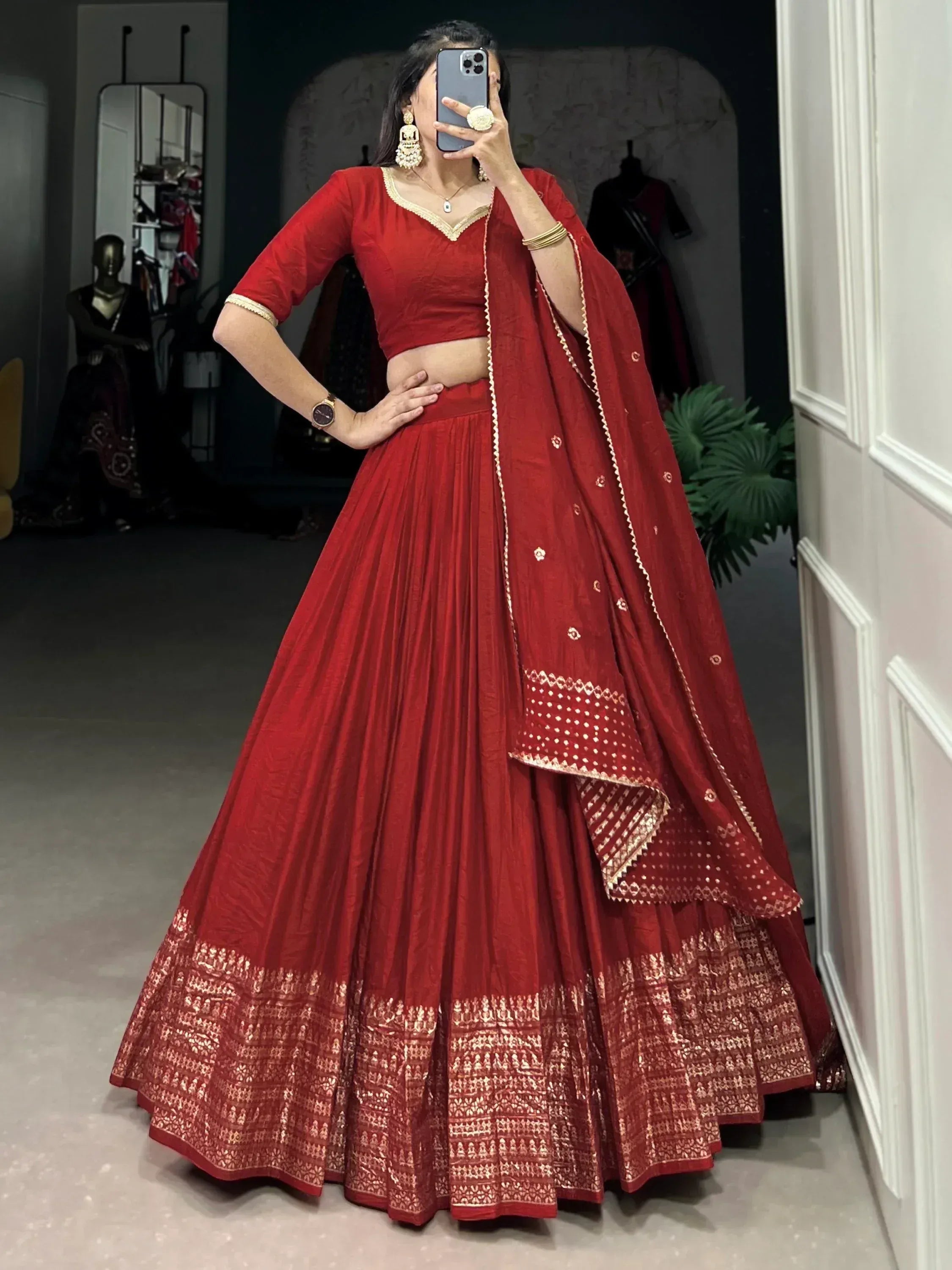 Red lehenga choli with gold embroidery, perfect for Indian ethnic wear and festive occasions