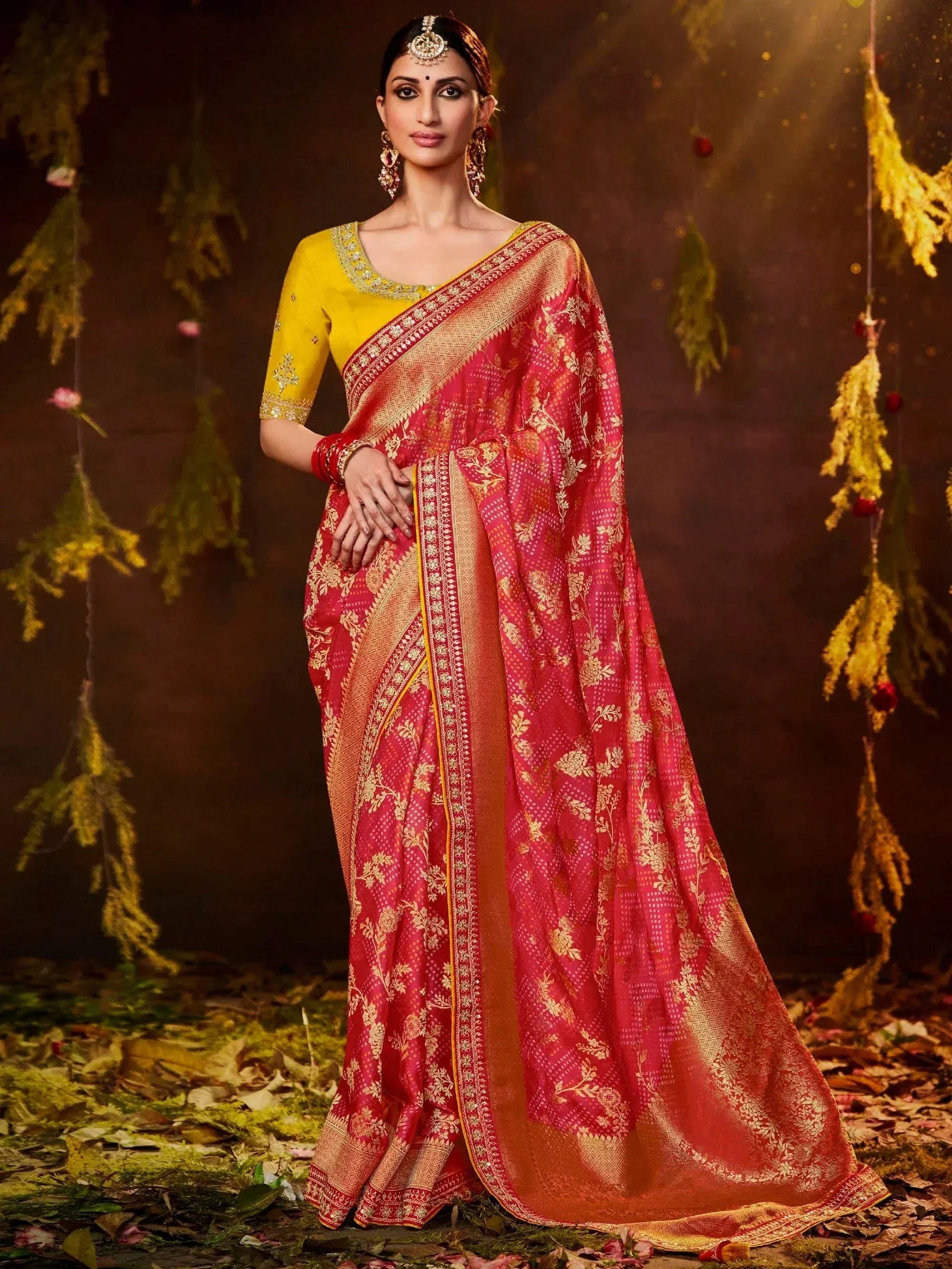 Red and gold floral saree with yellow blouse, perfect for Indian ethnic occasions and weddings
