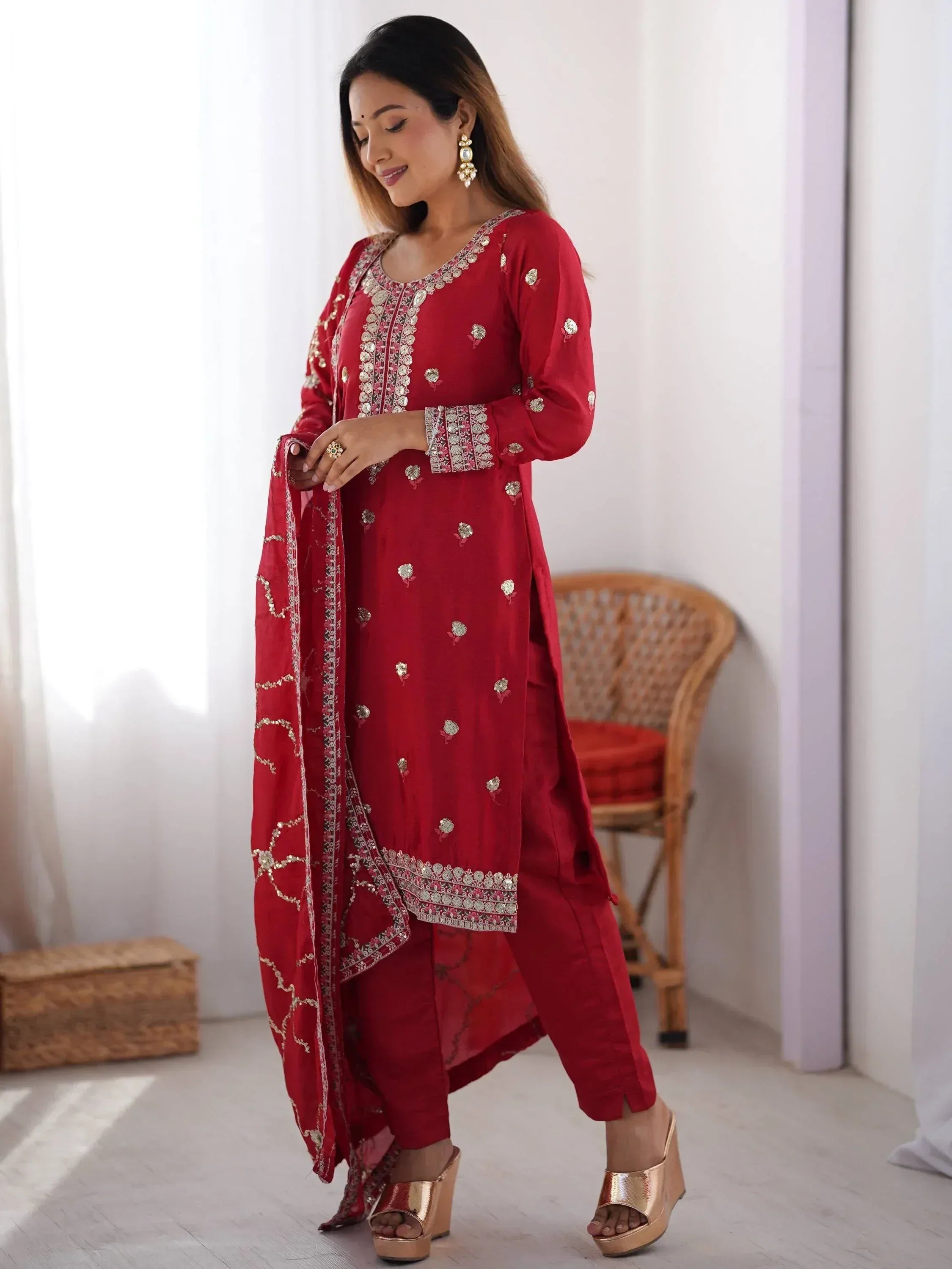Red embroidered salwar kameez with matching dupatta, perfect for Indian ethnic wear occasions.