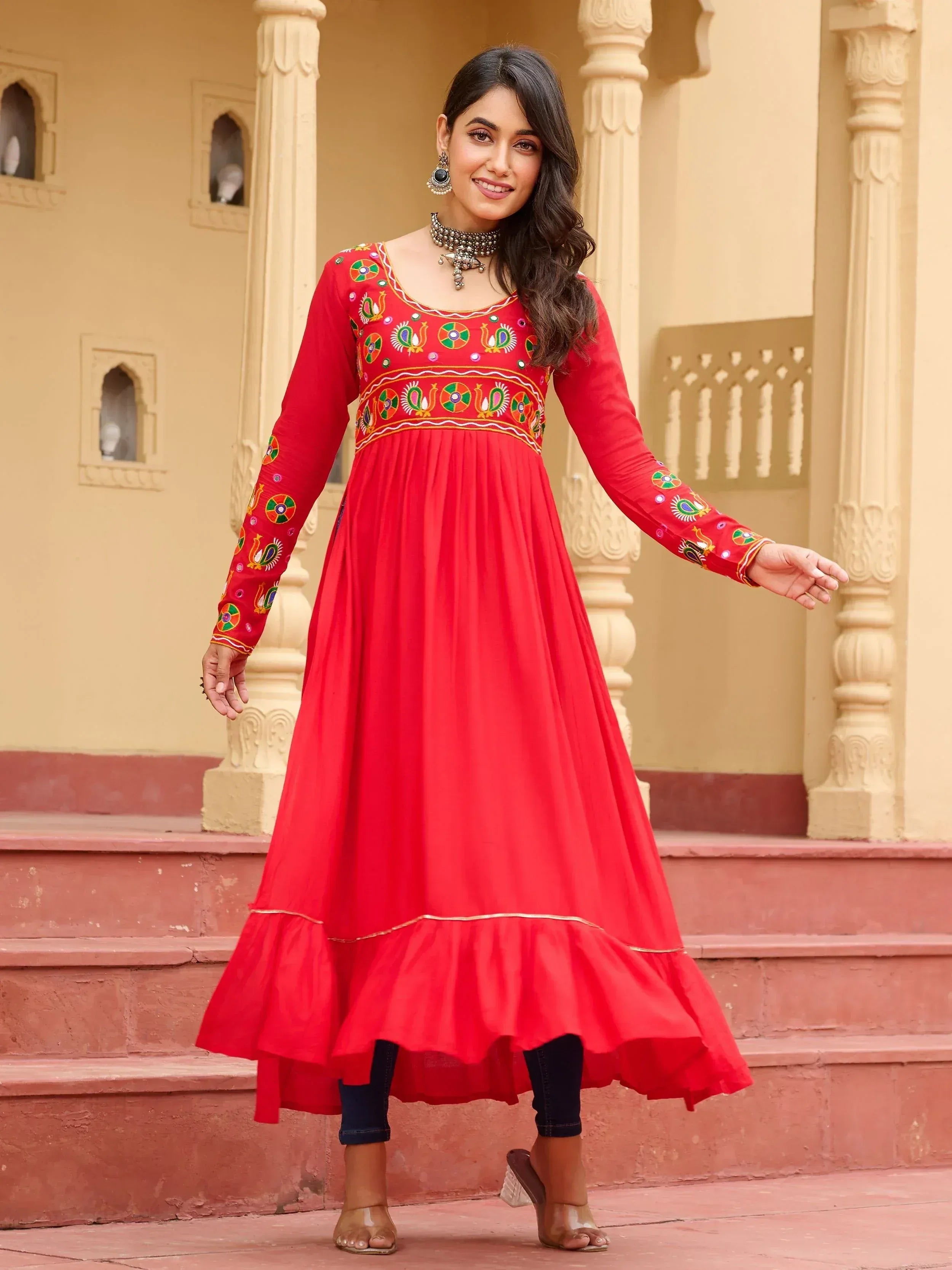 Red embroidered ethnic gown with peacock motifs, perfect for Indian festive wear and occasions