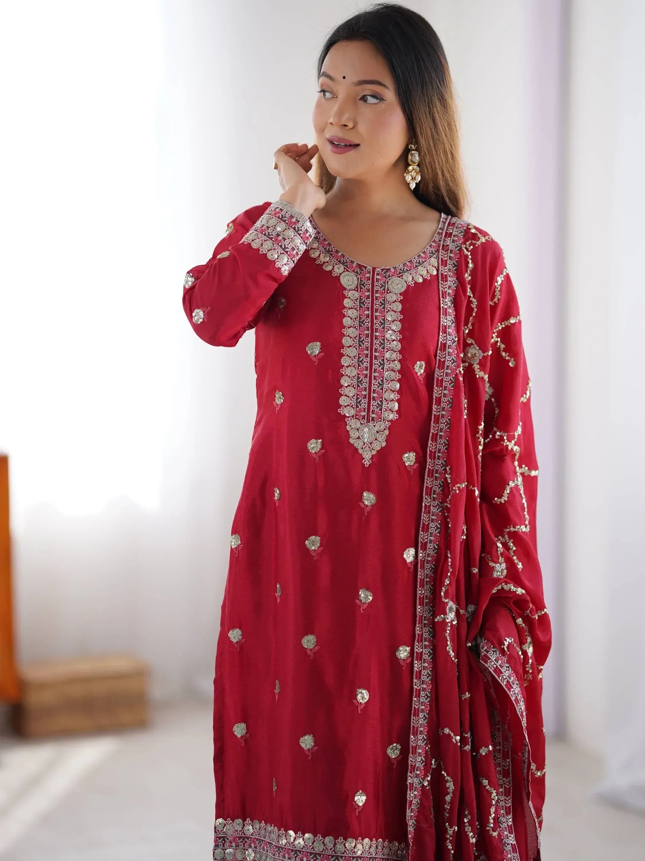 Red embroidered ethnic kurti with floral detailing and matching dupatta