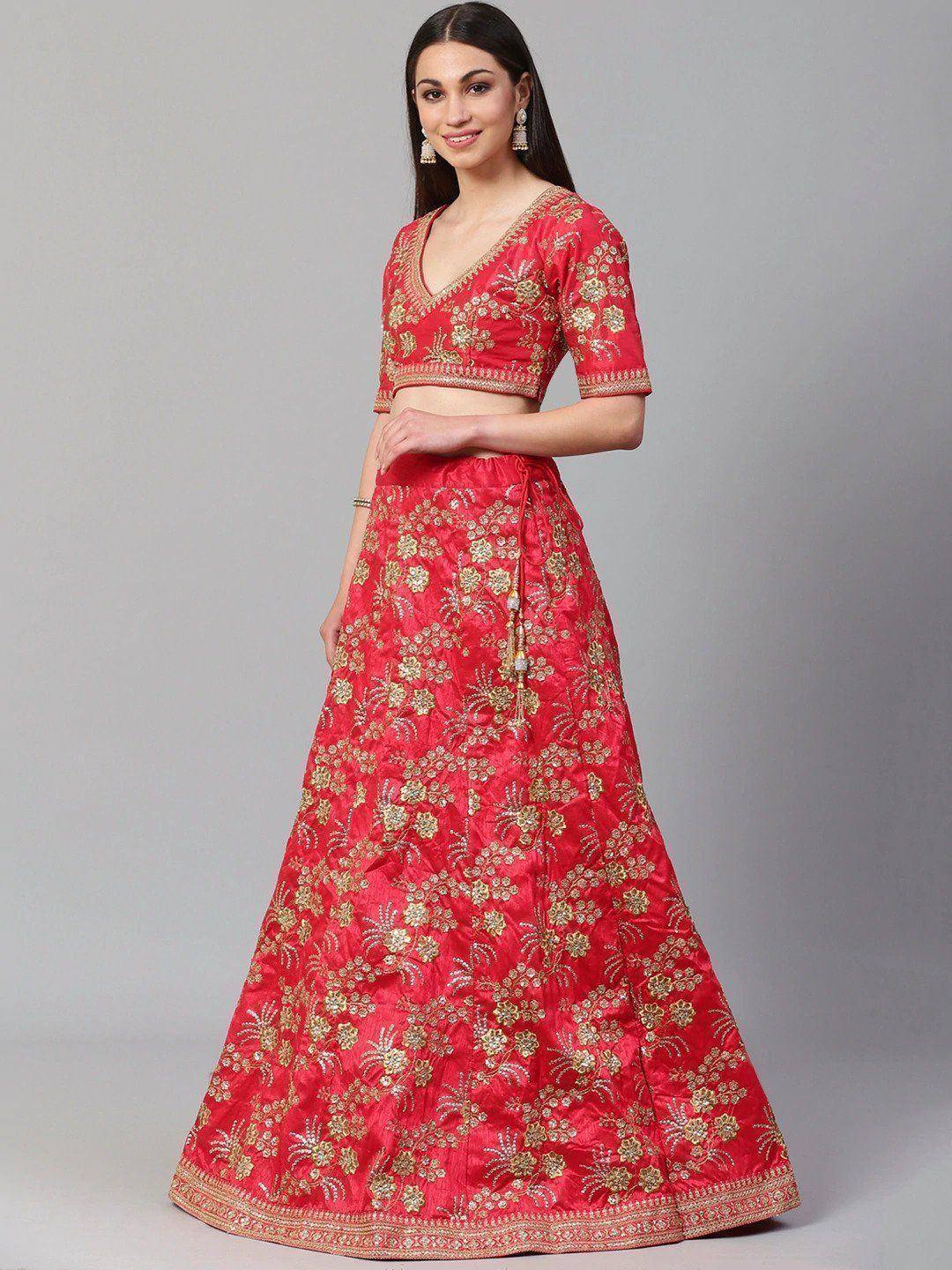 Red embroidered lehenga choli with gold floral work, perfect for Indian ethnic occasions