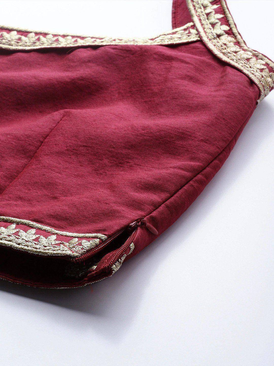 Maroon ethnic blouse with gold embroidery, perfect for lehenga choli or saree