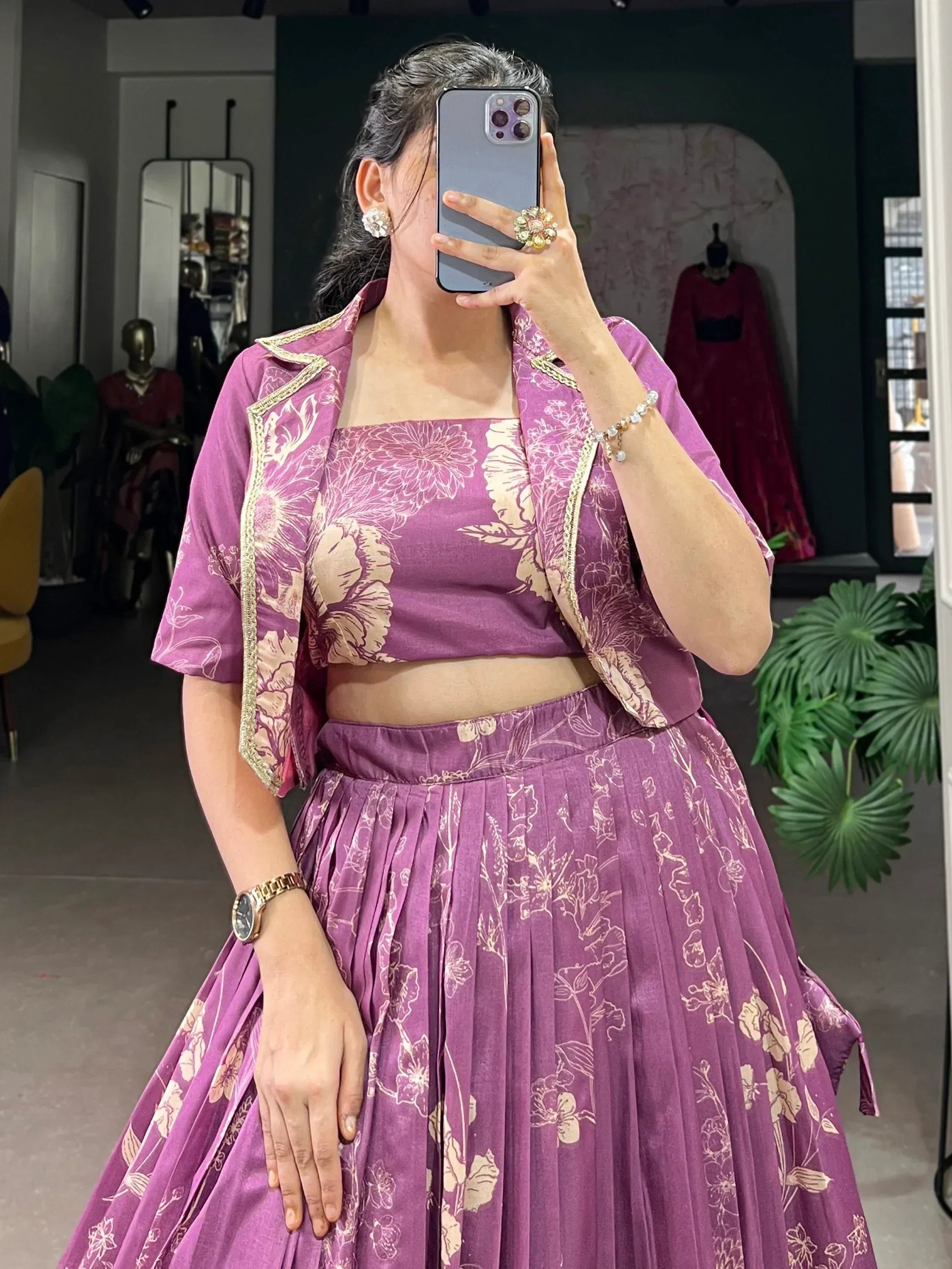 Purple floral lehenga choli with gold trim, perfect for Indian ethnic wear and designer occasions.
