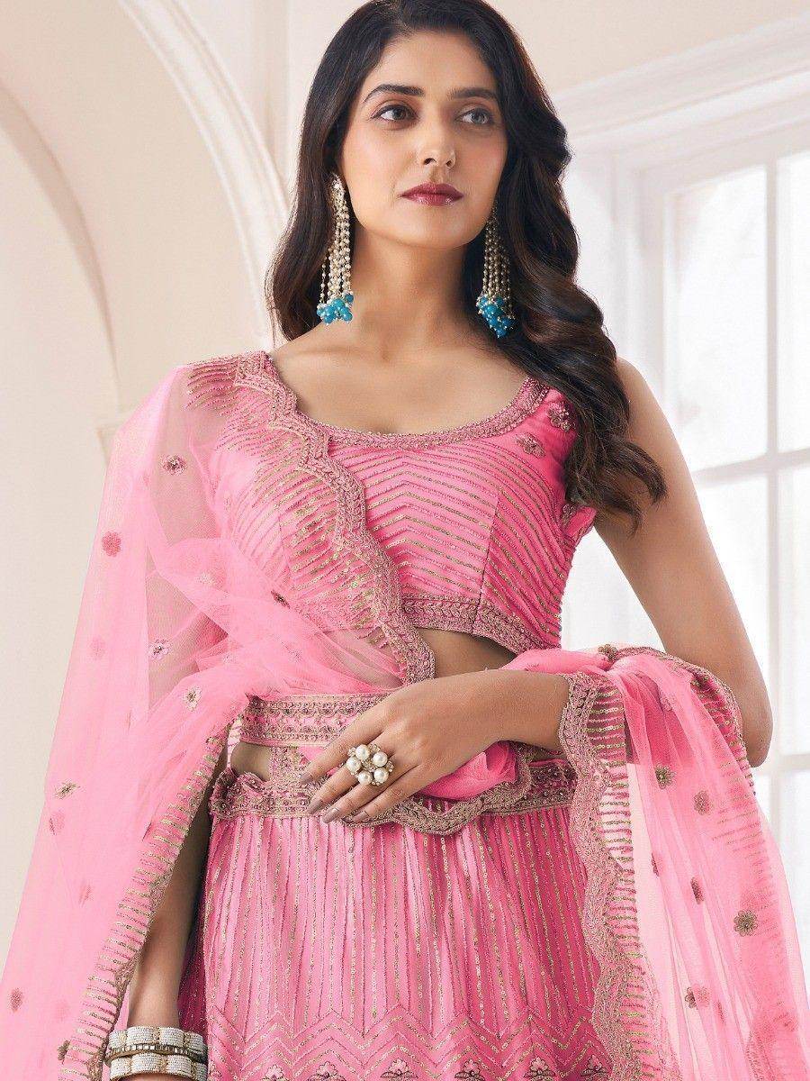 Remarkable Coral Pink Sequins Work Net Wedding Wear Lehenga Choli