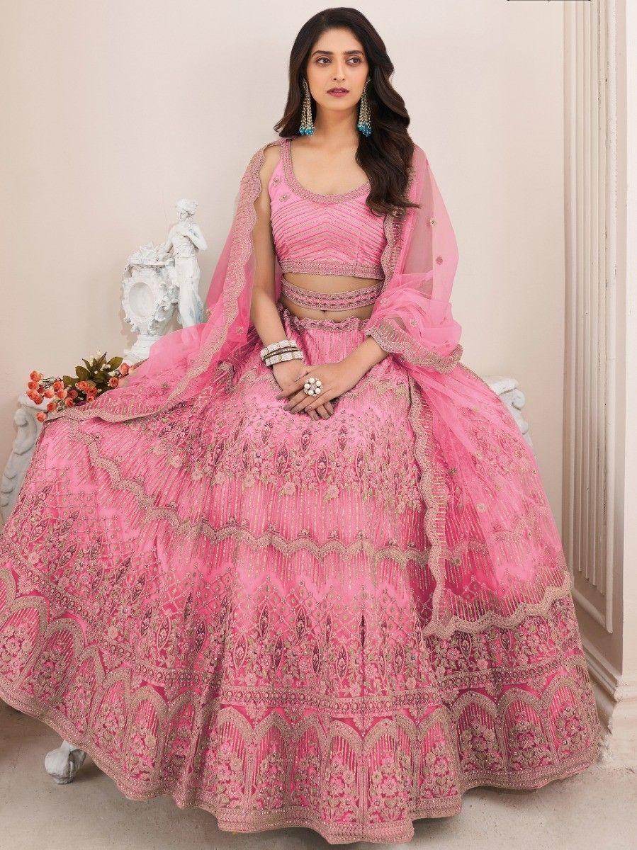 Remarkable Coral Pink Sequins Work Net Wedding Wear Lehenga Choli
