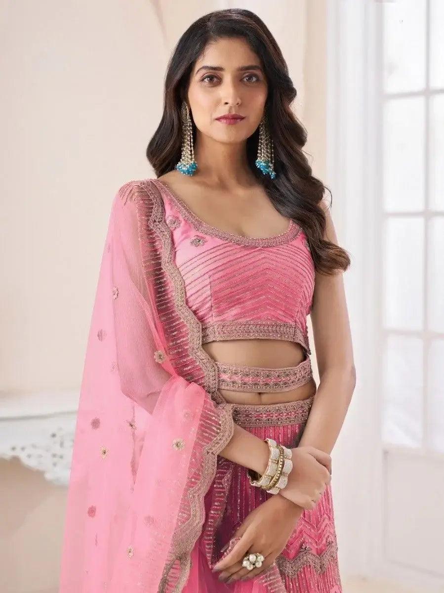 Remarkable Coral Pink Sequins Work Net Wedding Wear Lehenga Choli