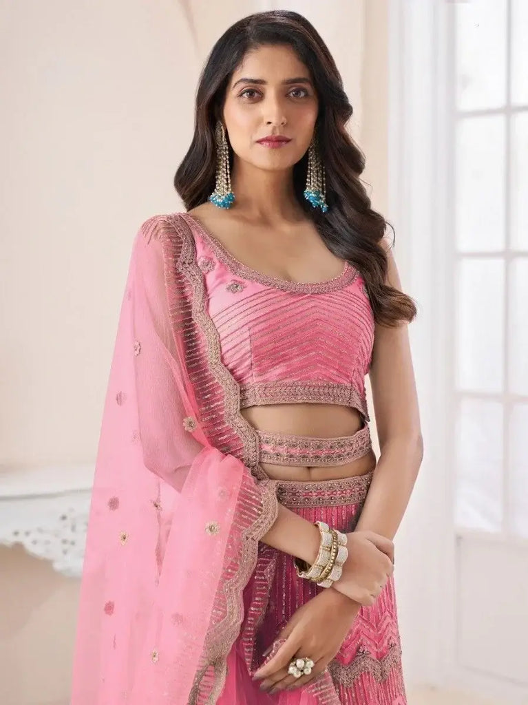 Remarkable Coral Pink Sequins Work Net Wedding Wear Lehenga Choli