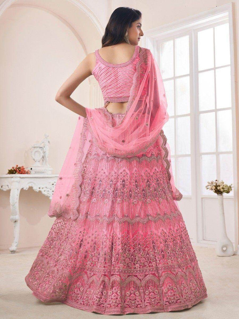 Remarkable Coral Pink Sequins Work Net Wedding Wear Lehenga Choli