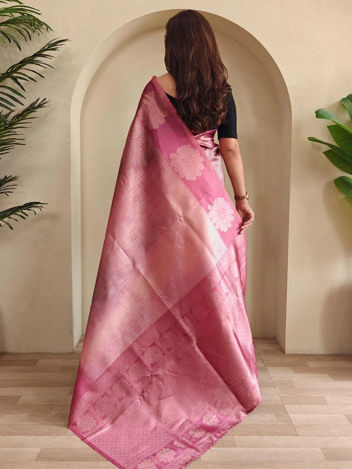 Pink floral designer saree with zari work, perfect for Indian ethnic wear occasions
