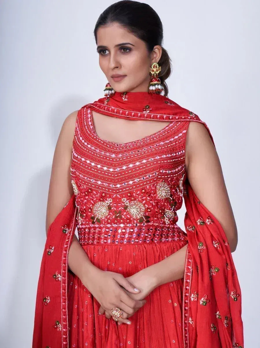 Red embroidered designer lehenga choli with matching dupatta, perfect for Indian ethnic wear occasions