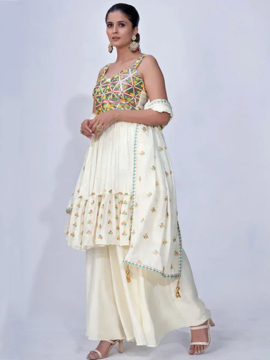 Woman in cream ethnic anarkali suit with embroidered dupatta and multicolor blouse