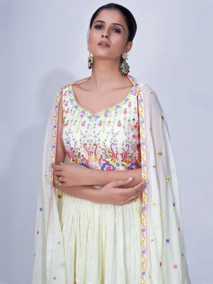 Elegant embroidered Indian ethnic gown with floral motifs and matching dupatta, perfect for festive occasions.