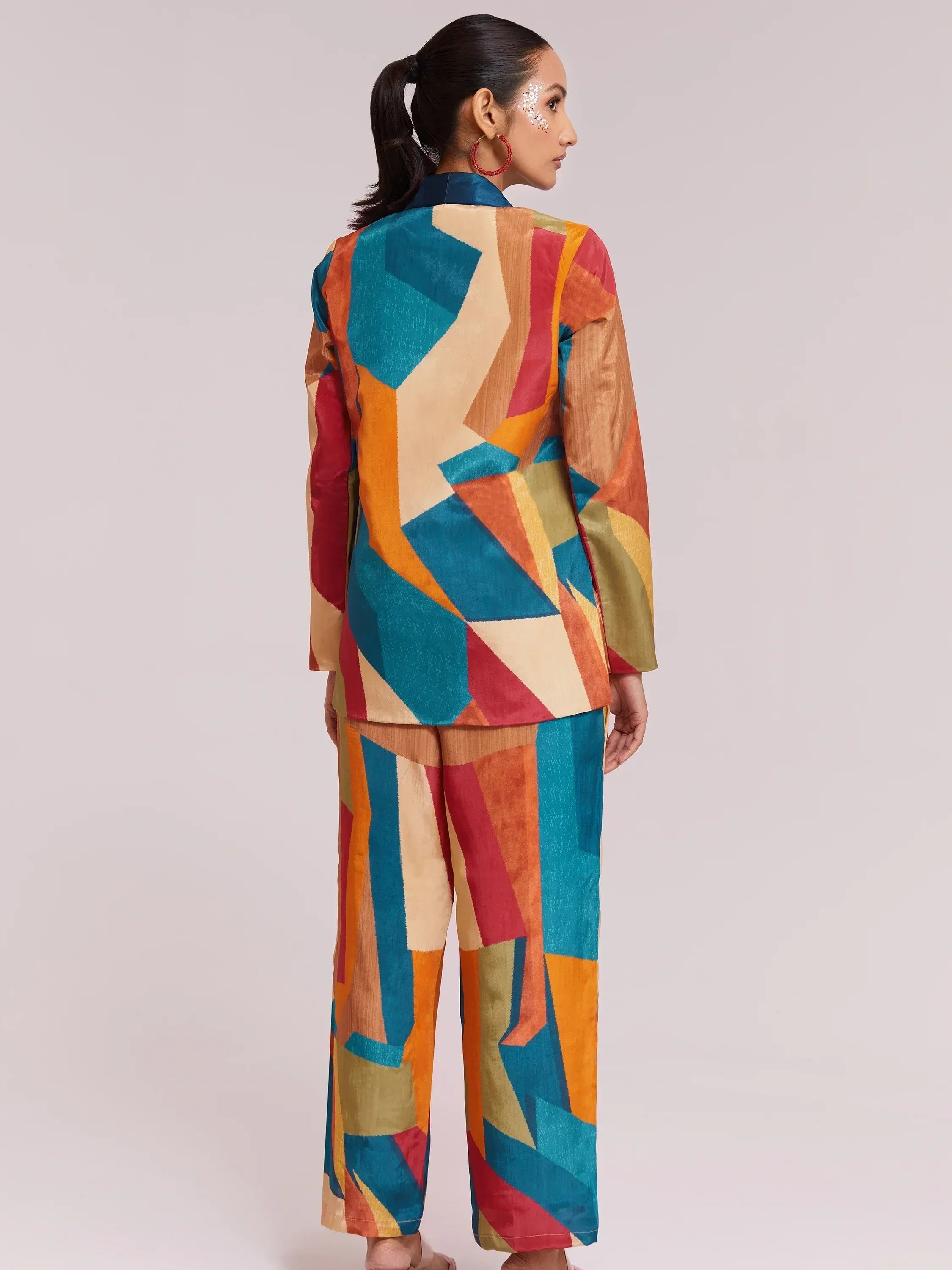 Colorful geometric print ethnic suit with wide pants, perfect for festive occasions