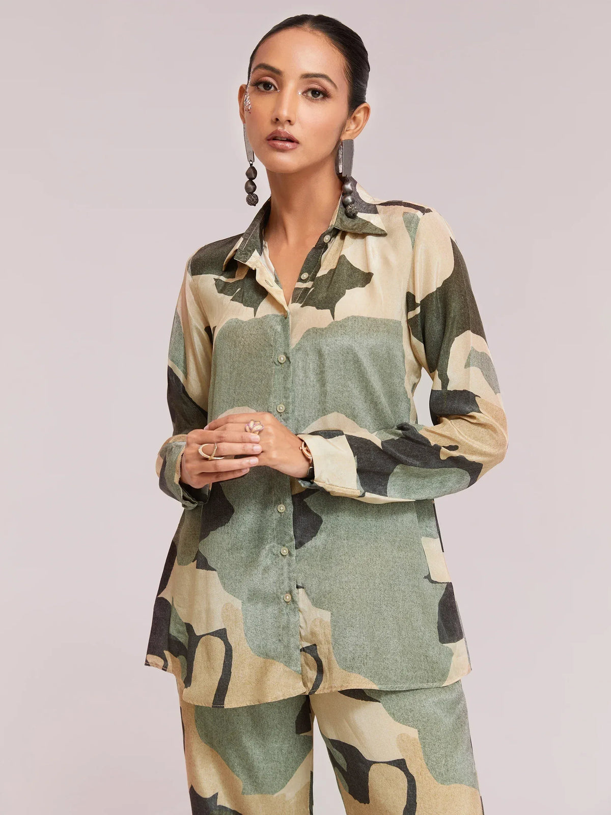 Woman in camouflage print ethnic shirt and pants set, stylish Indian wear