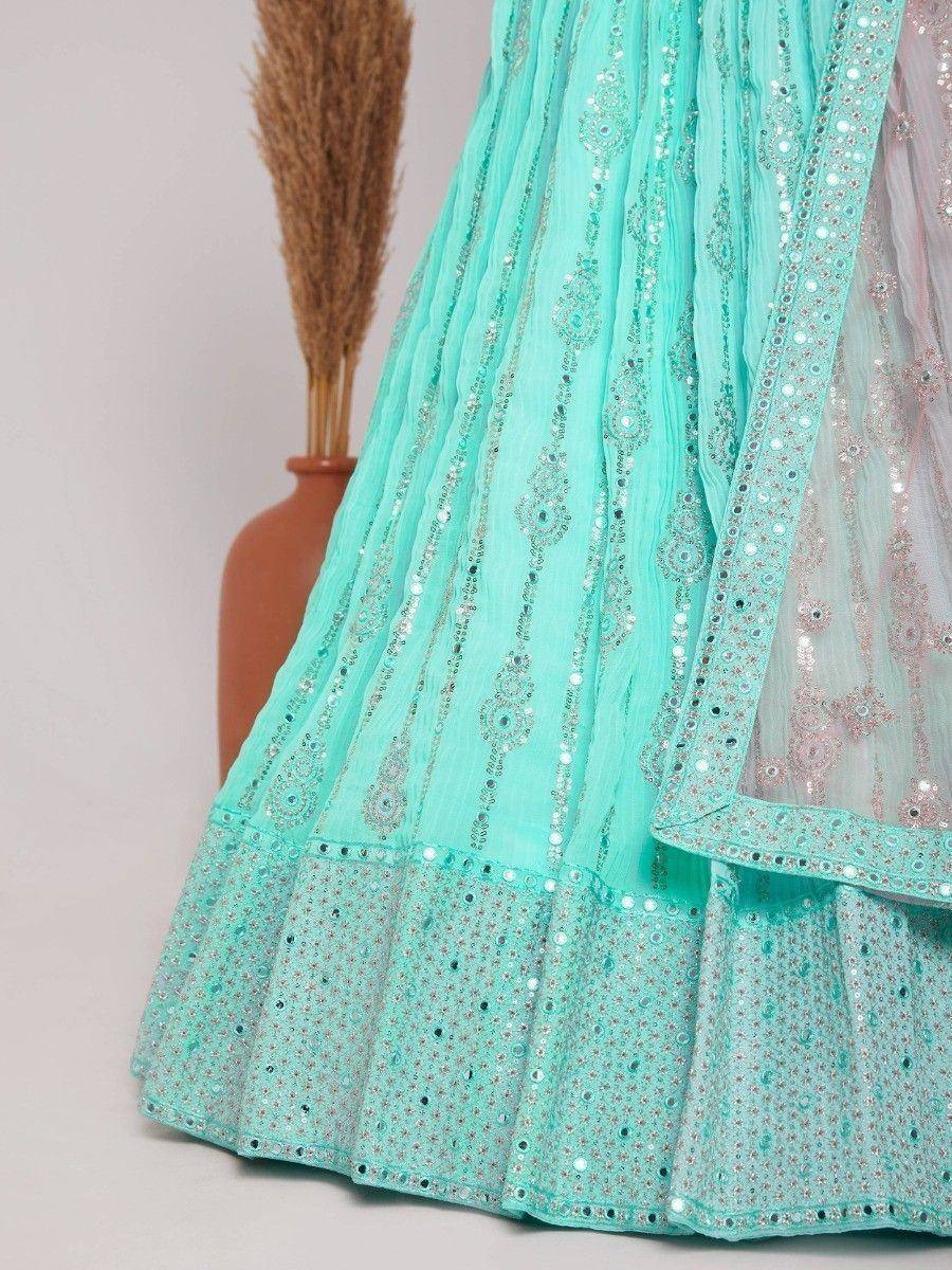 Mint green lehenga choli with mirror work and sequin embroidery, ethnic Indian wear