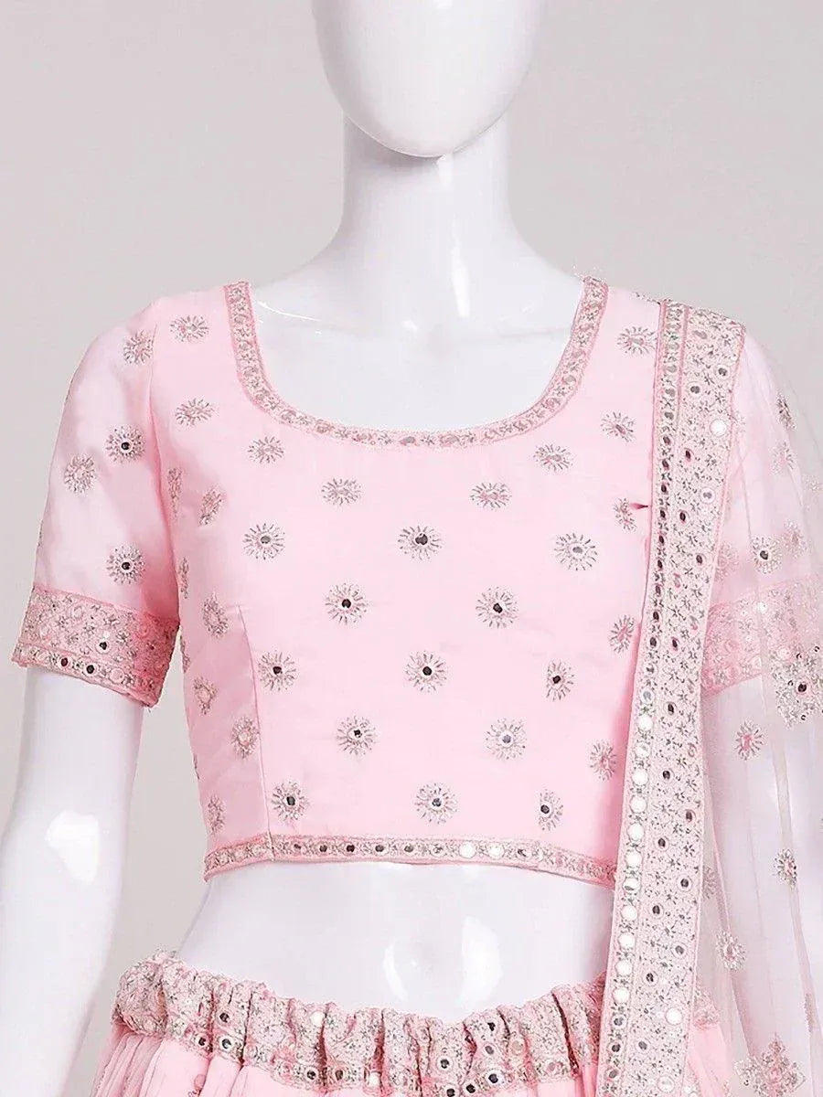 Pink embroidered lehenga choli with mirror work and sheer dupatta, ethnic Indian wear