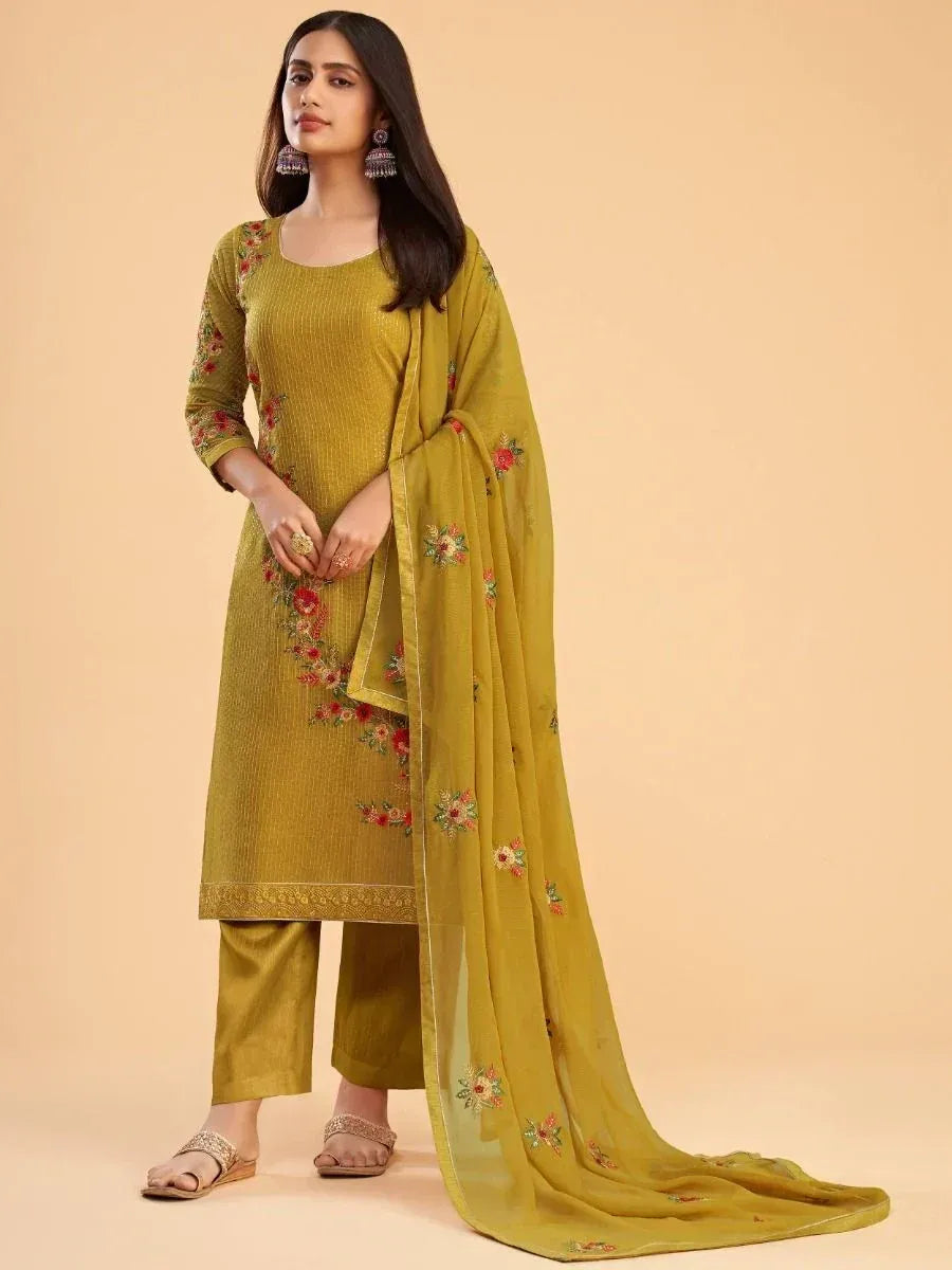 Woman wearing yellow embroidered salwar kameez with floral dupatta, Indian ethnic wear