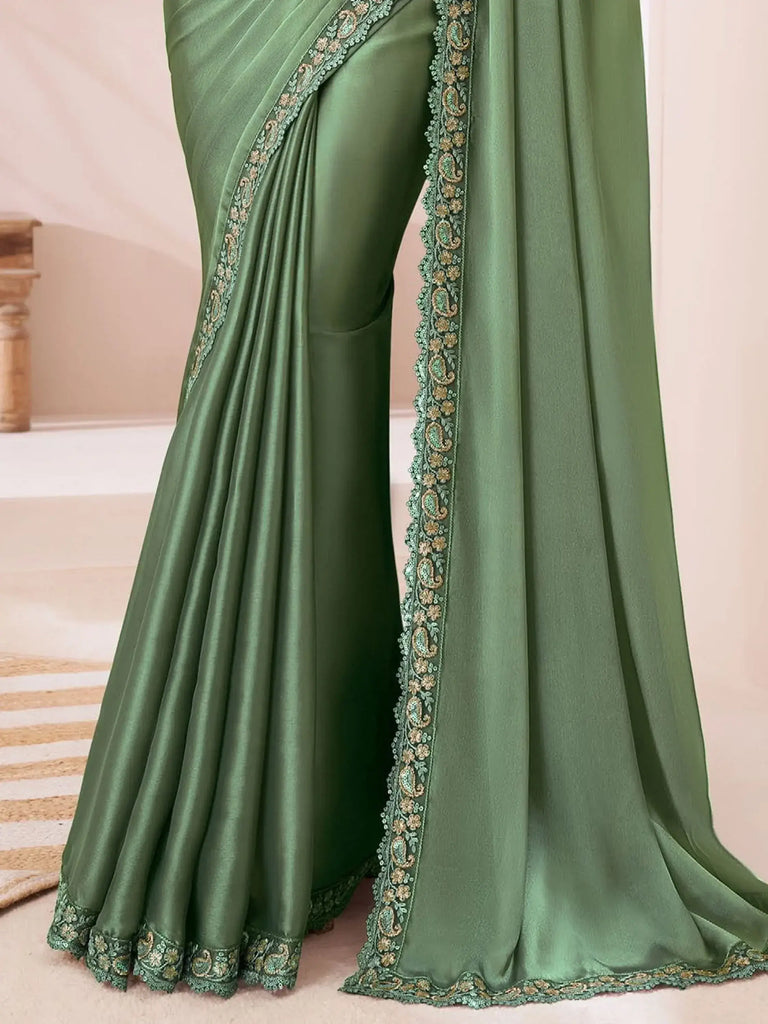 Enchanting Dusty Green Heavy Border Work Georgette Mehendi Wear Saree