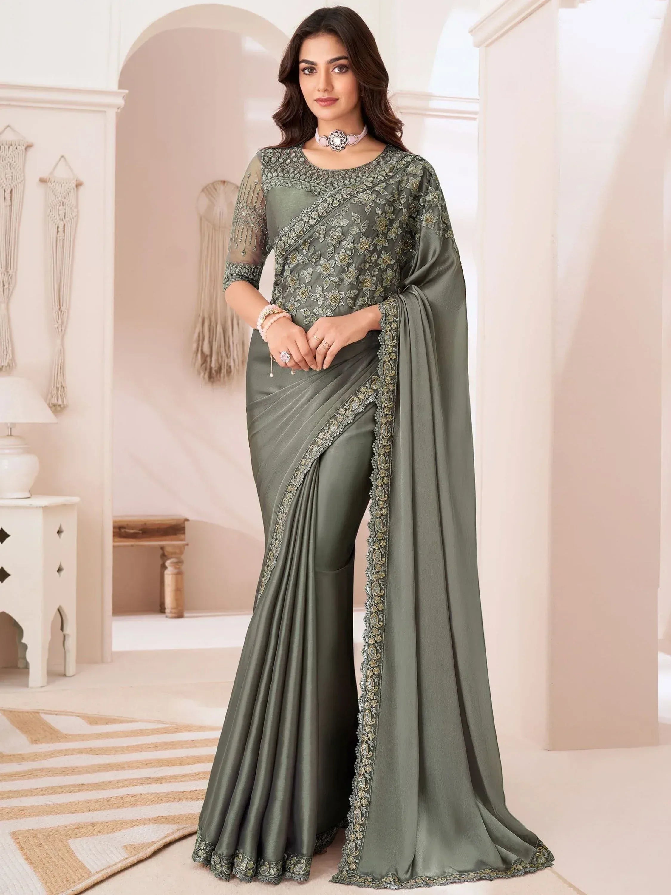 Olive green embroidered saree with sheer blouse, perfect for Indian ethnic occasions and weddings.