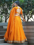 Amazing Orange Laheriya Print Georgette Haldi Wear Lehenga Choli