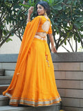 Amazing Orange Laheriya Print Georgette Haldi Wear Lehenga Choli