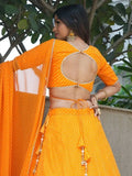 Amazing Orange Laheriya Print Georgette Haldi Wear Lehenga Choli