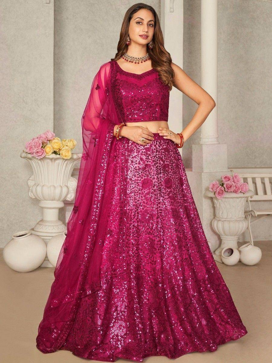 Fuchsia sequin lehenga choli with sheer dupatta, perfect for Indian weddings and festive occasions