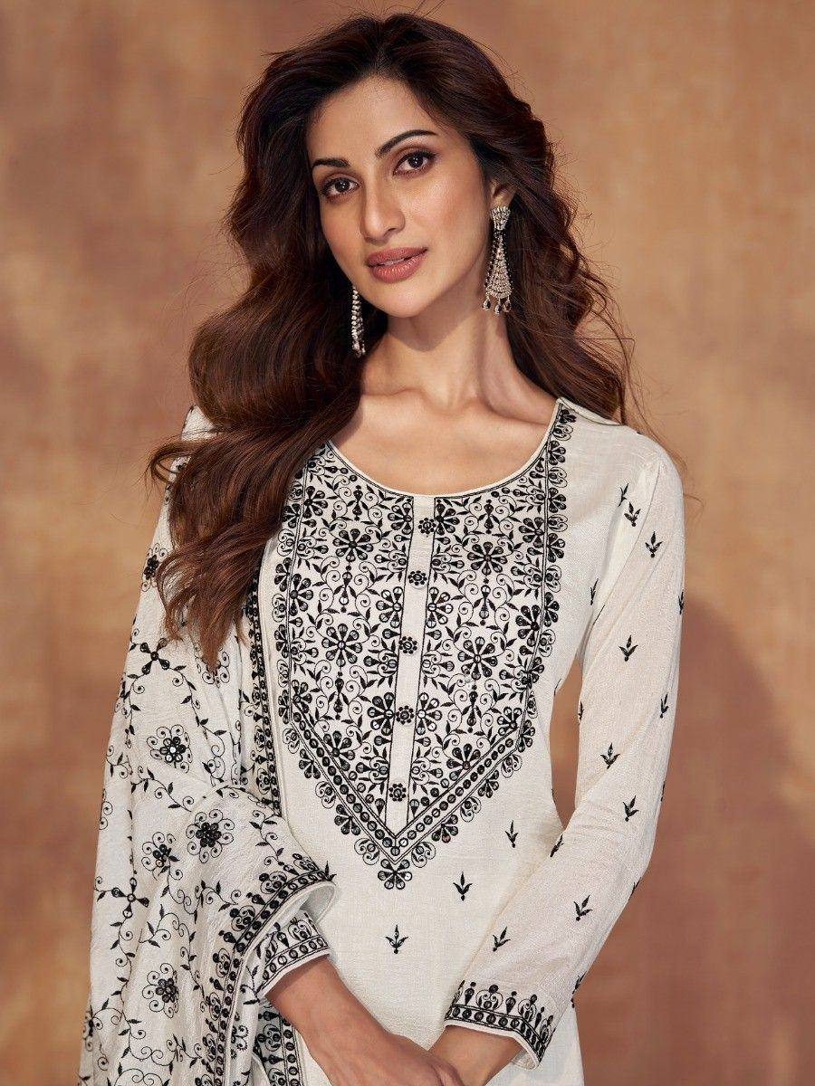 White ethnic kurti with black floral embroidery, perfect for Indian wear and festive occasions