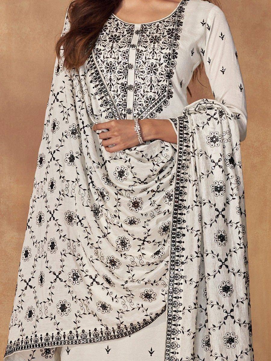 White embroidered salwar kameez with black floral print, ethnic Indian wear for women