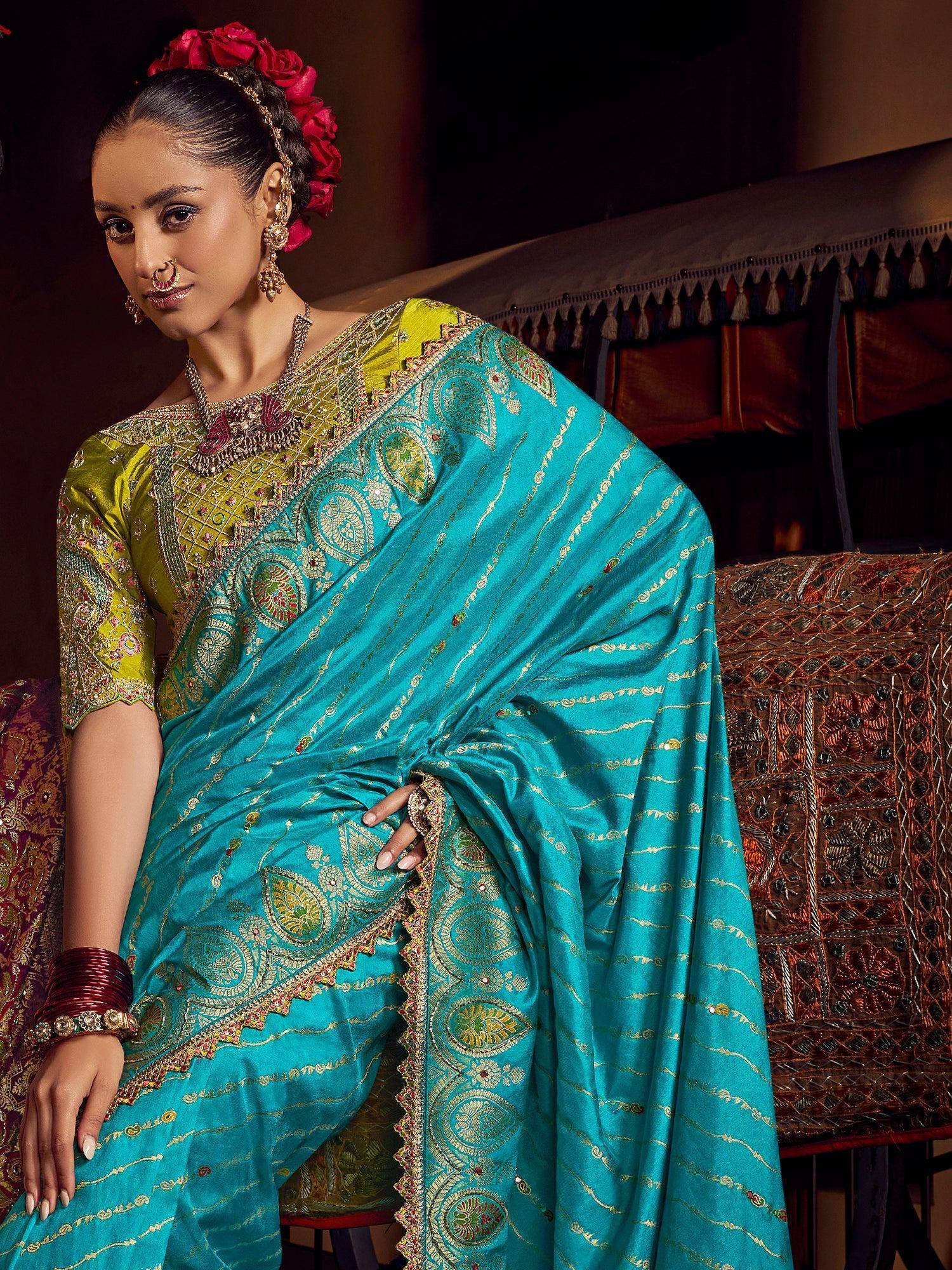 Turquoise embroidered saree with green blouse, perfect for Indian ethnic wear and festive occasions