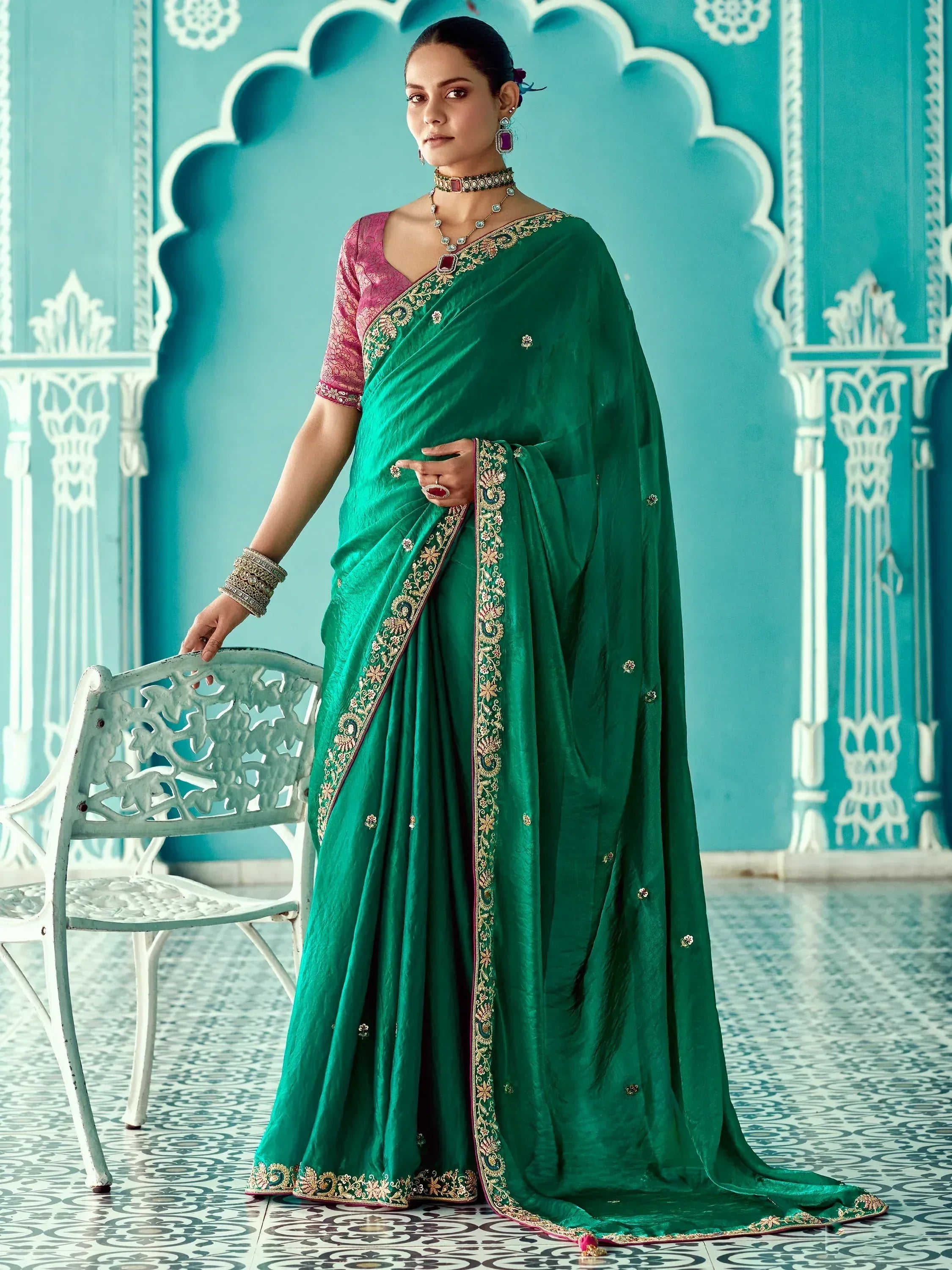 Emerald green embroidered saree with pink blouse, traditional Indian ethnic wear for women