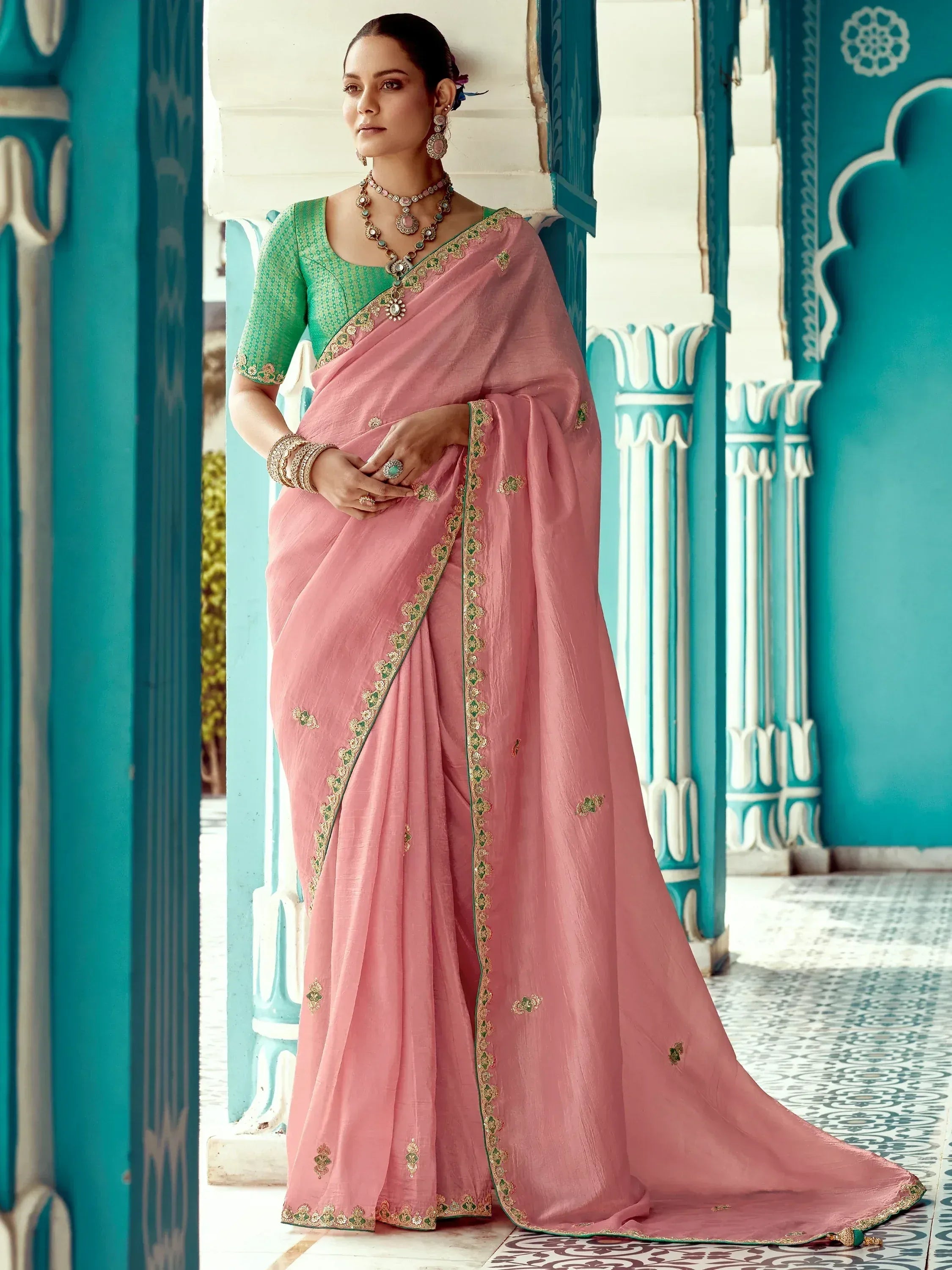 Pink embroidered saree with green blouse, traditional Indian ethnic wear for women