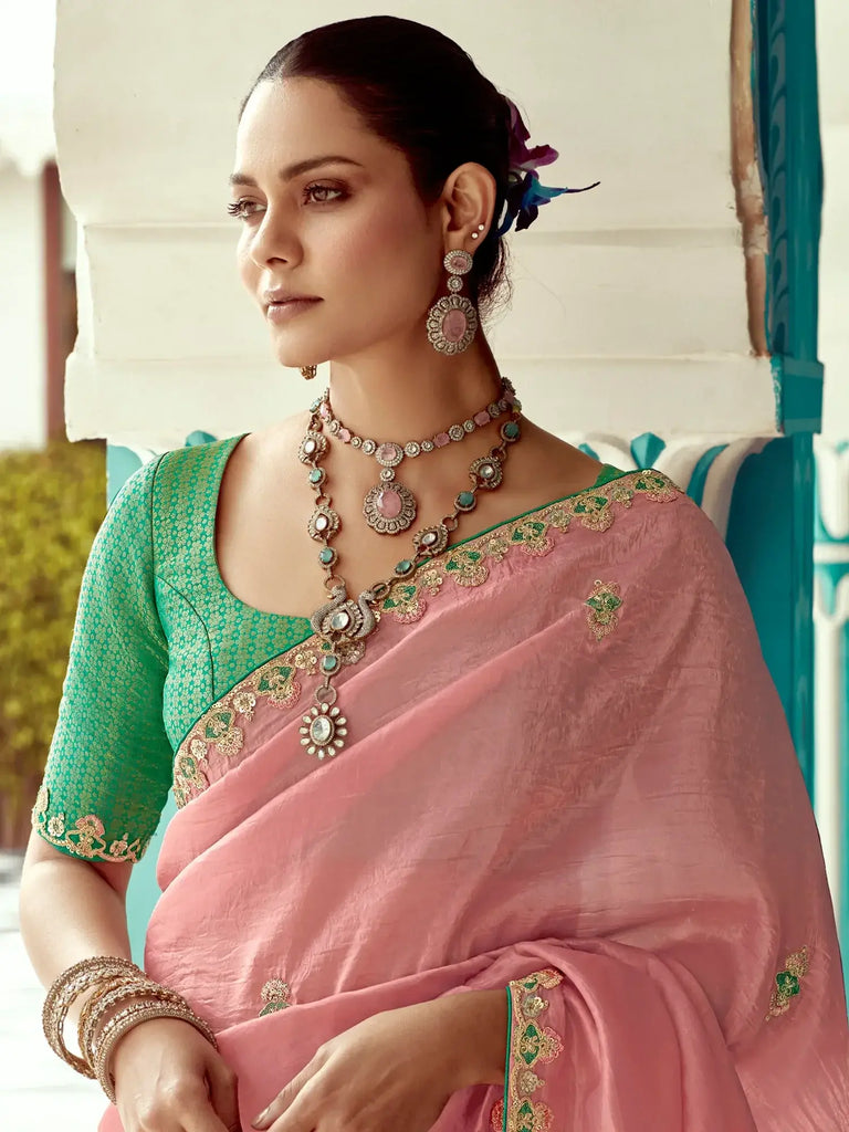 Charming Peach Heavy Border Work Tissue Silk Saree With Blouse