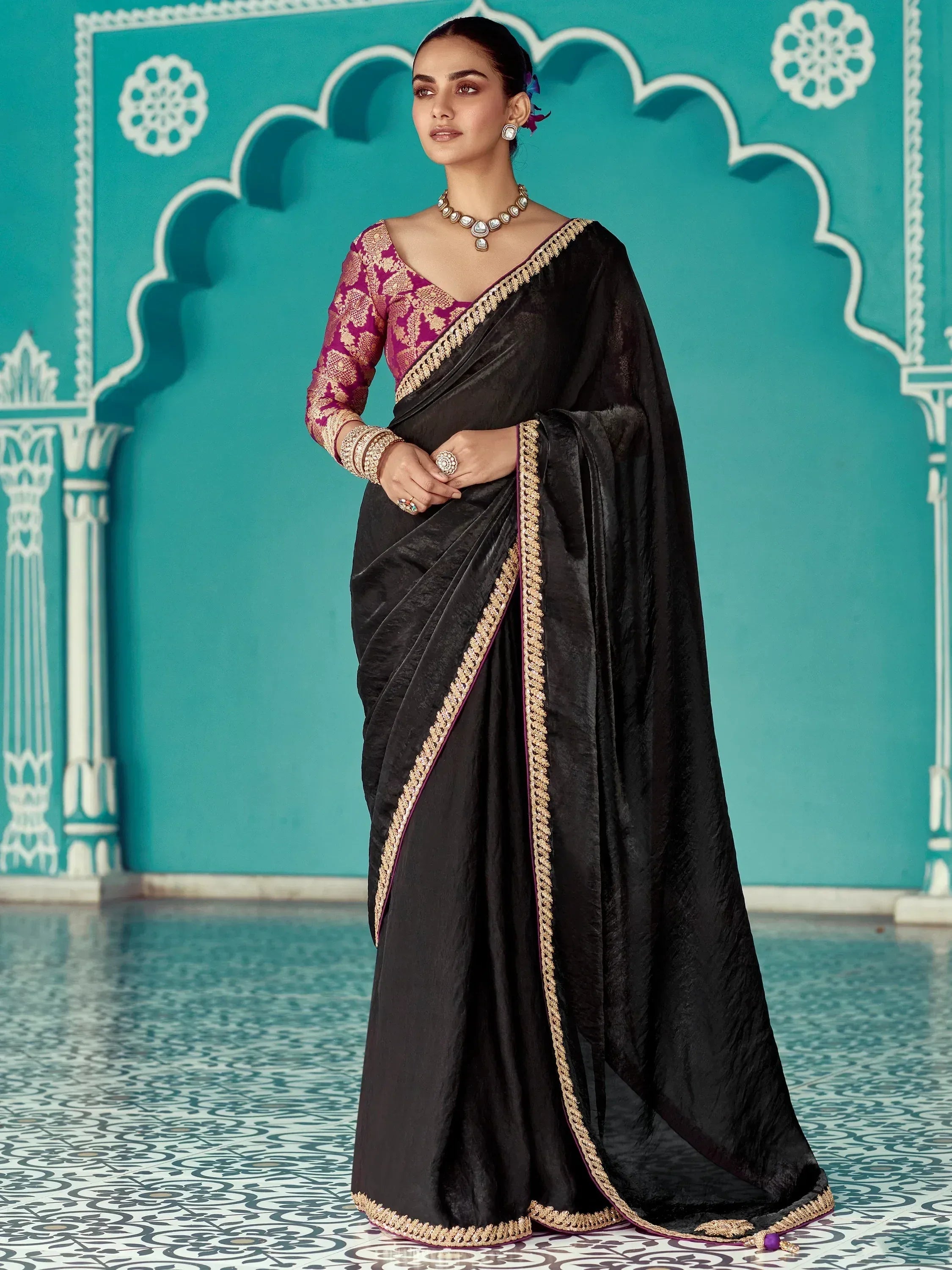 Black velvet saree with gold border and purple blouse, Indian ethnic wear for women