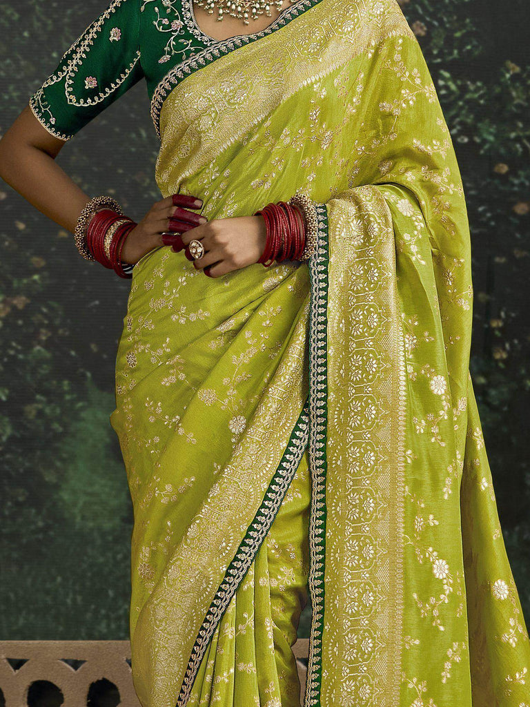 Bewitching Lime Green Zari Weaving Silk Traditional Saree With Blouse