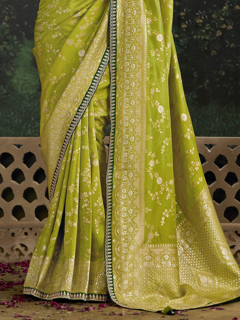 Bewitching Lime Green Zari Weaving Silk Traditional Saree With Blouse