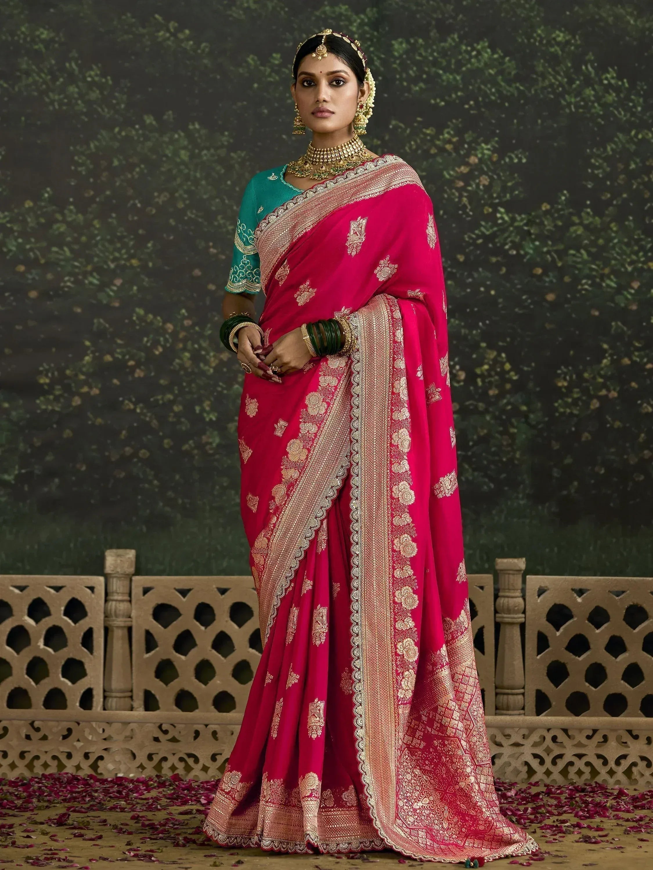 Pink and gold embroidered saree with green blouse, traditional Indian ethnic wear for weddings