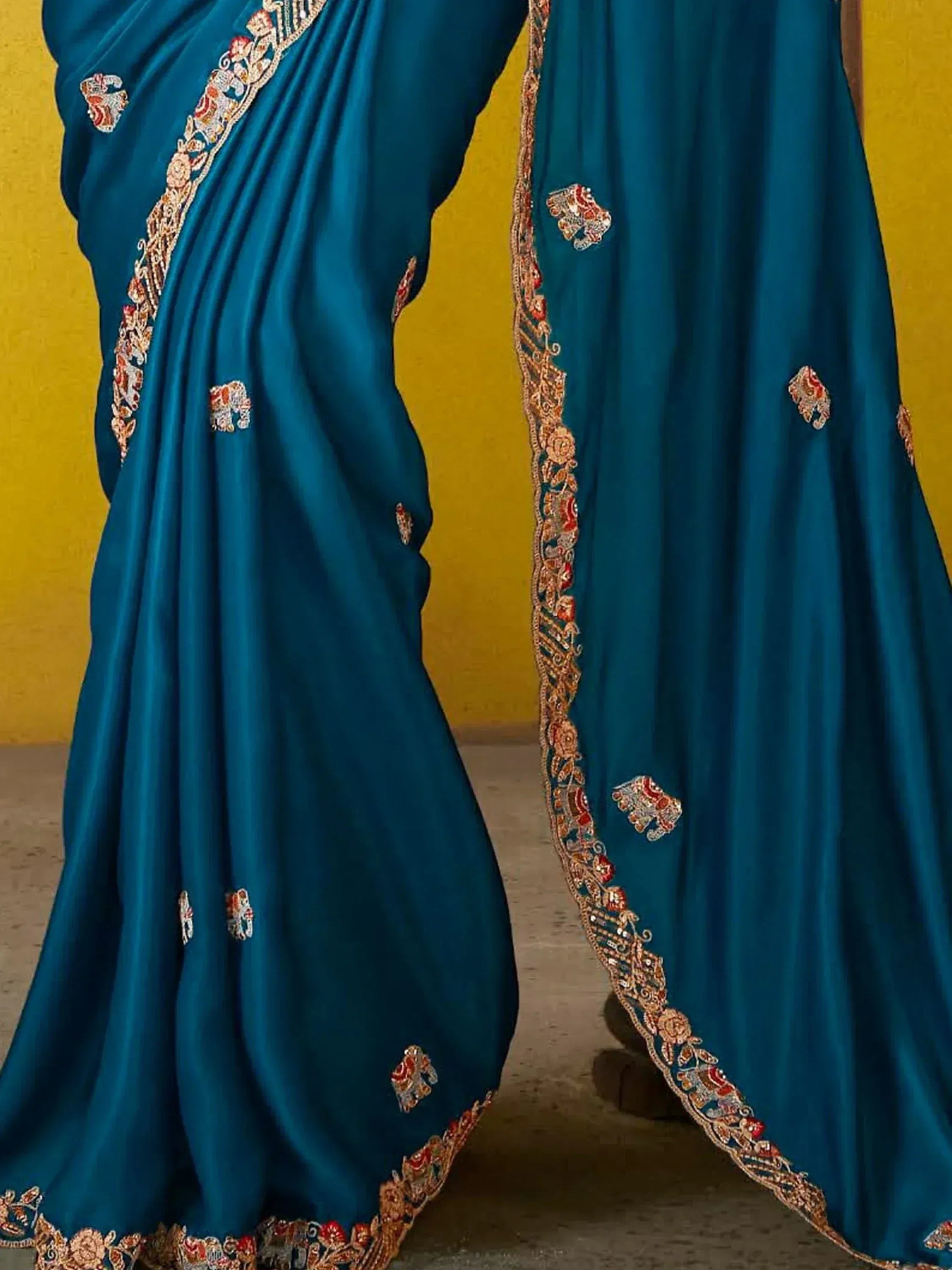 Teal blue saree with elephant embroidery and gold border, Indian ethnic wear