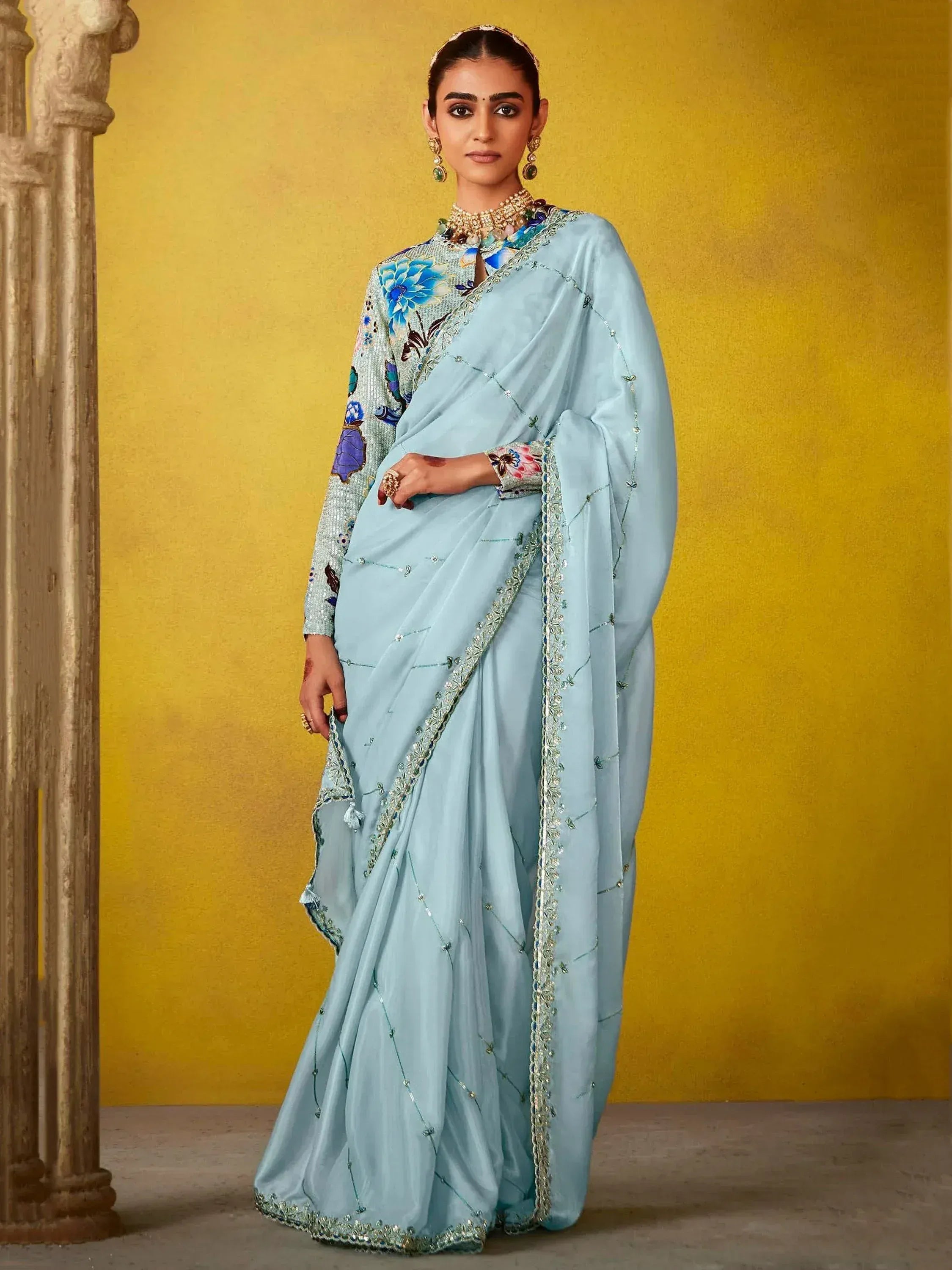 Light blue designer saree with floral embroidery and sequin work, perfect for Indian ethnic occasions