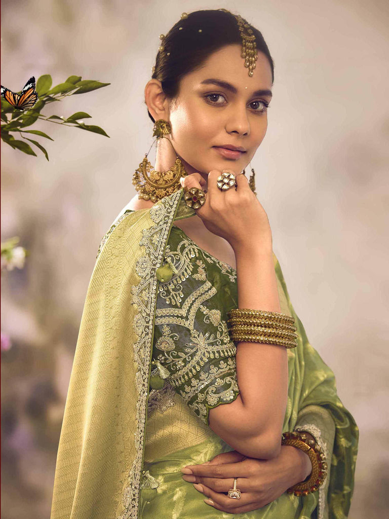 Attractive Green Zari Weaving Organza Mehendi Wear Saree With Blouse