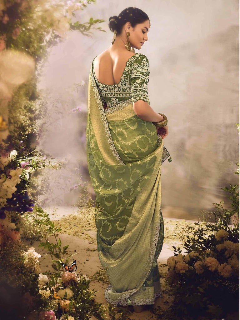 Attractive Green Zari Weaving Organza Mehendi Wear Saree With Blouse