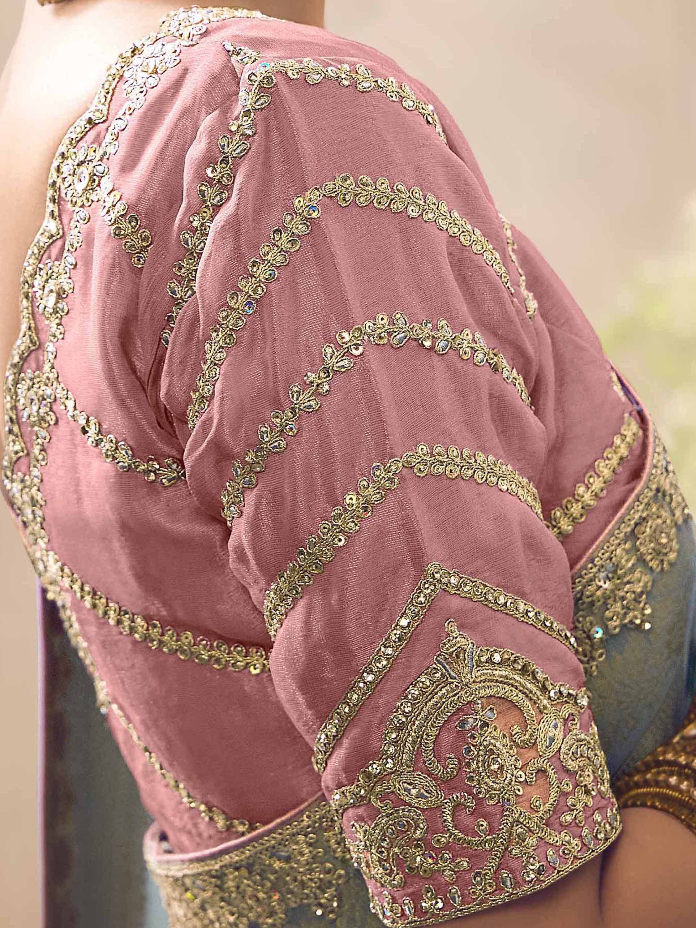 Pink designer lehenga choli with gold embroidery and stone work, ethnic Indian wear