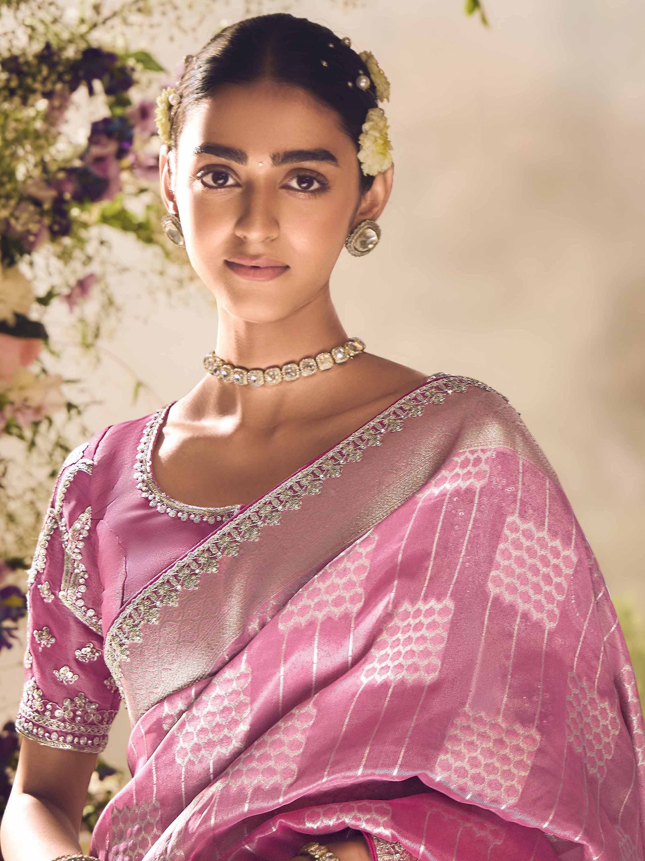 Elegant pink designer saree with gold embroidery, perfect for Indian ethnic wear occasions